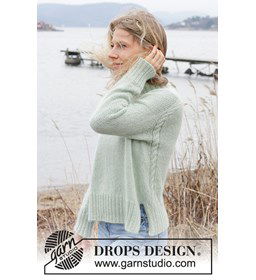 Damestrui met kabelpatroon over zijnaad achterpand gemaakt van Drops Kid Silk