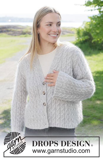 damesvest met sierlijke kabels en v-hals