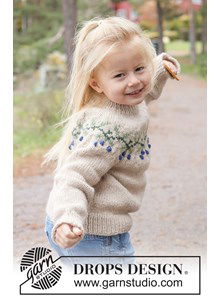 Gebreide kindertrui met ronde pas en bessenpatroon