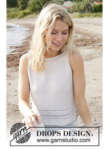 Damestop met kantpatroon en boothals