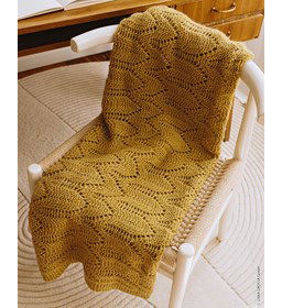 Deken in pijlvormig ajourpatroon gemaakt van Rondbreinaald nr 5