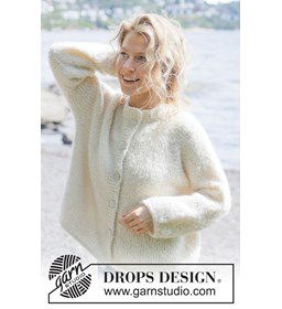 Zacht gebreid vest met raglan en ballonmouwen gemaakt van knopen