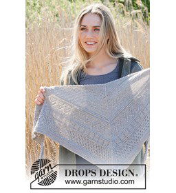 Omslagdoek met verschillende inbreipatronen gemaakt van Drops Merino extra fine