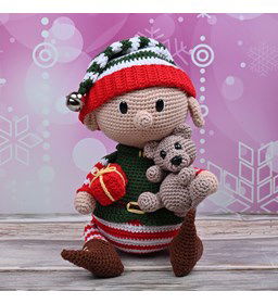 Kerstelf Koen gemaakt van Boeken poppen en dieren