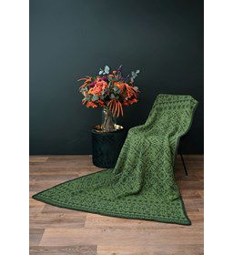 Deken met Noorse patronen gemaakt van boeken haken