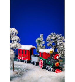 De Kerstexpress trein gemaakt van Lang Yarns Quattro, Quattro Lame en Quattro color