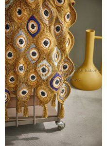 Woondeken met kwastjes