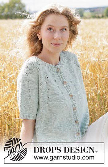 Gebreid damesvest met kantpatroon op ronde pas