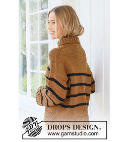 Gestreepte trui met splitten in de zijnaad gemaakt van Drops Alaska