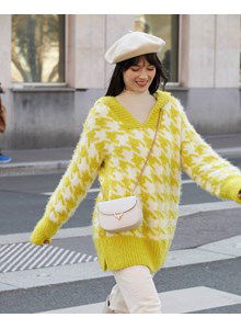 Lang damesvest met brede boorden