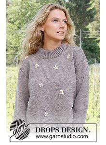 Damestrui met boterbloempjes en dubbel gebreide brede halsboord.