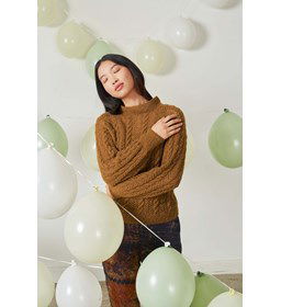 Damestrui met ajour- en kabelpatroon gemaakt van Lang Yarns Zen