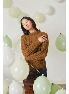 Damestrui met ajour- en kabelpatroon