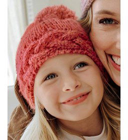 Kindermuts met pompon gemaakt van Phildar Phil Tweedy