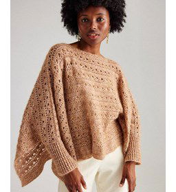 Poncho met mouwboorden gemaakt van Phildar Phil Irise Alpaga