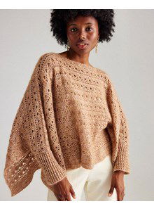 Poncho met mouwboorden