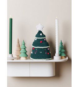 Denneboom met glimlach gemaakt van Haaknaalden