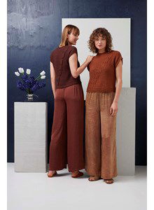 Mouwloze damestrui Nike met diagonaal kabelpatroon