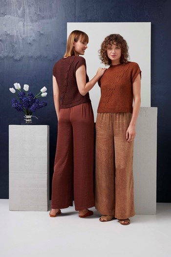 Mouwloze damestrui Nike met diagonaal kabelpatroon