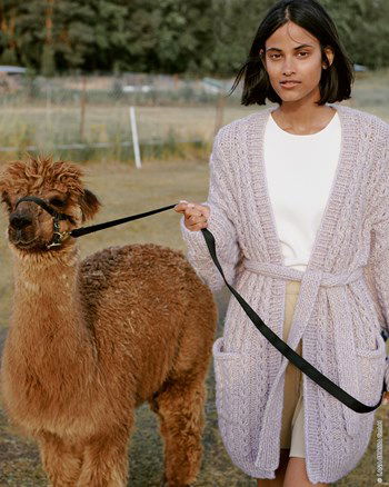 Lange damesvest met ceintuur en zakken