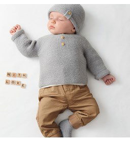 Babytrui met knoopjes gemaakt van knopen