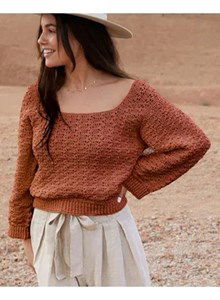 Damestrui met wijde mouwen en hals.