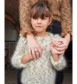 Meisjestrui met gerimpelde rand langs mouwinzet gemaakt van Rondbreinaald nr 5,5