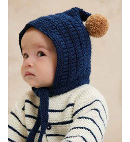 Babymutsje met pompon gemaakt van Handwerk accesoires