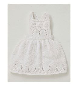Babyjurkje met geborduurde bloemen gemaakt van Phildar Phil Rustique