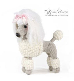 Poedel gemaakt van lint, band, franje, strikjes, bloemen