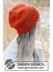 Muts met kantpatroon langs boord