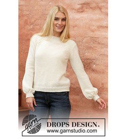 Damestrui White Rose met subtiele kabels gemaakt van Drops Nord