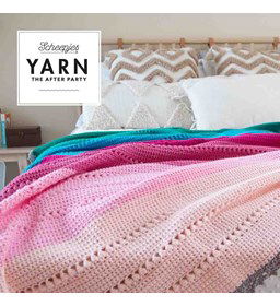 Deken in gekleurde banen gemaakt van Scheepjes Organicon