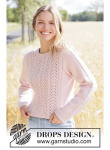 Romantische gebreide trui met kabels en kantpatroon