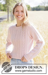 Romantische gebreide trui met kabels en kantpatroon