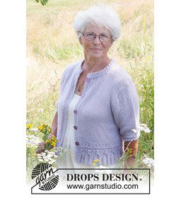 Damesvest met korte mouwen gebreide kwastjes patroon gemaakt van Drops Kid Silk