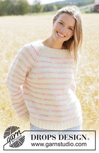 Oversized gebreide raglantrui met spikkelstrepen