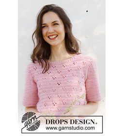 Gehaakte damestrui met korte mouwen en bloemenpatroon. gemaakt van Drops Cotton Merino