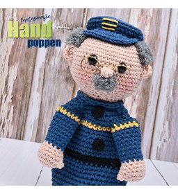 Handpop politieagent gemaakt van Decoratie en miniaturen