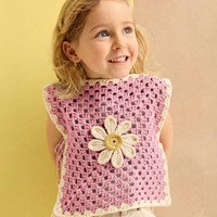 poncho met madeliefje