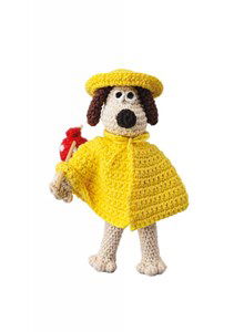 Hond Gromit met regenjas