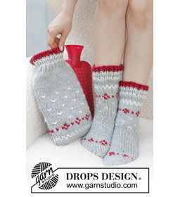 Sokken met Scandinavisch patroon gemaakt van Drops Snow - Eskimo