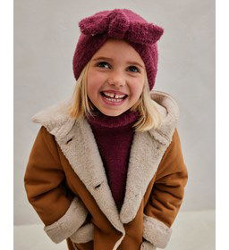 Muts met strik gemaakt van Phildar Phil Romance