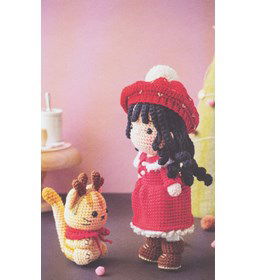 Meisje met katje gemaakt van DMC E-nummers