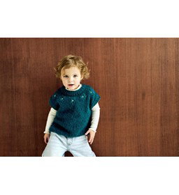 kinderspencr Simone met bloempatroon gemaakt van Handwerk accesoires