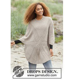 Dames poncho gemaakt van knopen