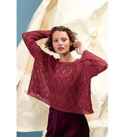 Korte en wijde damestrui in kantpatroon