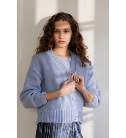 Damesvest met brede heupboord gemaakt van knopen