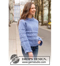 Damestrui met reliëfpatroon en dubbele halsrand gemaakt van Drops Snow - Eskimo