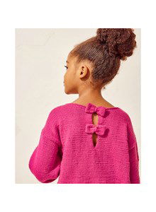 Kindertrui met strikjes op achterpand